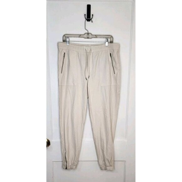 Athleta Cream Farallon Jogger Pants Zip Ankle Pockets Women's Size 14 - Picture 1 of 6